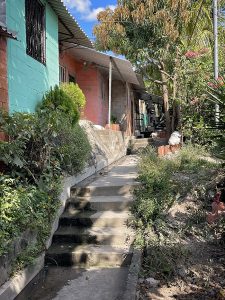 A residential street in Apopa, headed away from the river.